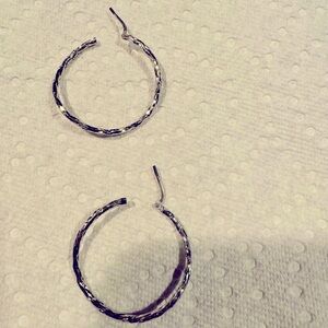 Medium Sterling Silver twisted hoop earrings. Never Worn
